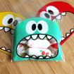 Picture of 100 PCS Cute Big Teech Mouth Monster Plastic Bag Wedding Birthday Cookie Candy Gift OPP Packaging Bags, Gift Bag Size:10x10cm (Red)